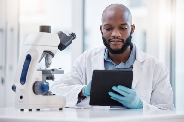 istock Shot ofa a young man using a tablet in a laboratory 1365756231