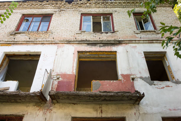istock Old three-storey brick house for demolition 1365756982