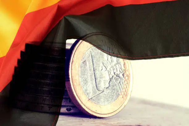 Photo of Flagge von Deutschland und Euro Münzen