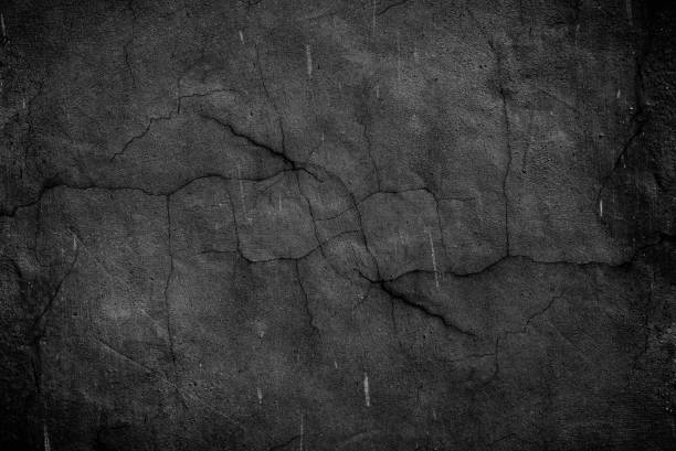 istock Cracked surface of cement plaster wall for texture background 1365759750