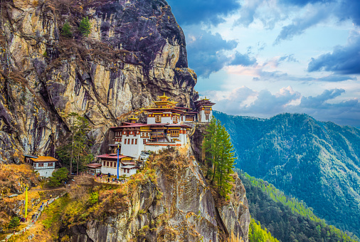 view of the Tiger's Nest monastery also known as the Paro Taktsang and the surrounding area in Bhutan. Travel and religion concept