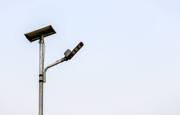 istock Abandoned old pole of solar light under the foggy sky with copy space 1365760069