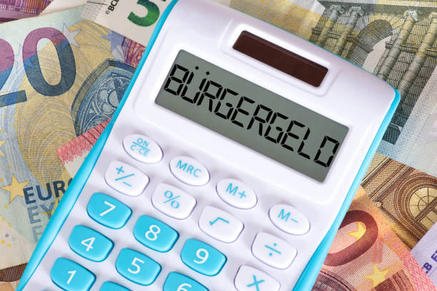 istock Euro banknotes, calculators and citizens' money in Germany 1365760710