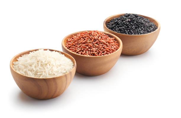 istock Three types of rice in bowls - basmati rice, red rice and black rice 1365763944