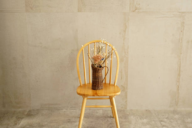 istock Dried flowers on the chair. 1365764055