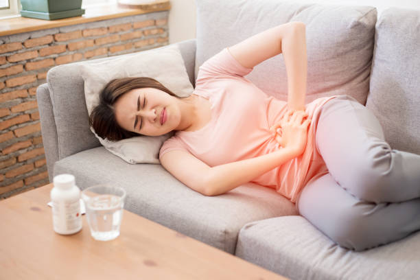 Asian women have abdominal pain because of menstruation. stock photo