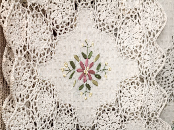 istock Tablecloths and napkins, decorated with embroidery and lace. 1365769568
