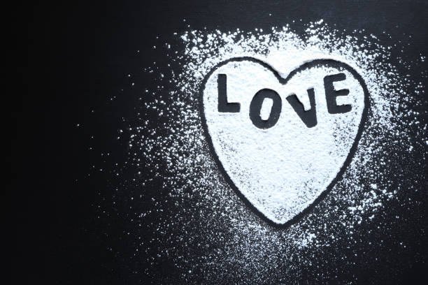 istock Black background with text love and heart shape on wooden table with a place for text or images.valentine day or mother's day concept 1365776464