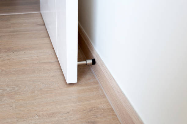 istock White door with door stopper 1365783542