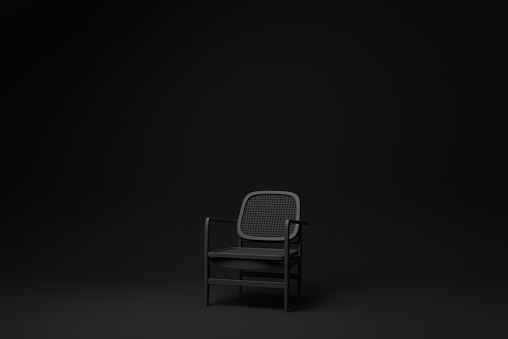 Black wooden comfortable chair on Black background. minimal concept idea. monochrome. render render.