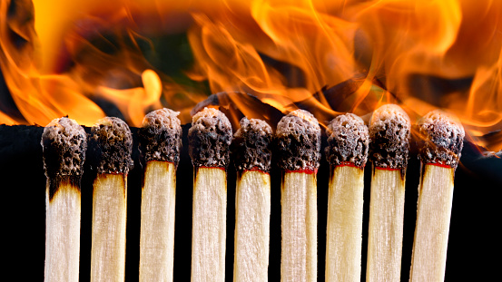 Matchsticks contain potassium chlorate, phosphorus, sulfur, small amounts of magnesium, and iron oxide.  Some types of wooden matches also contain red phosphorus.