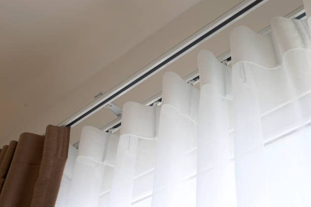 istock Curtains door or window, Curtain rail with white and brown curtain 1365784881