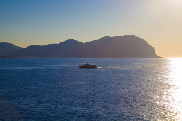 istock maritime coast with promontory on the background in Sicily, Italy 1365787022