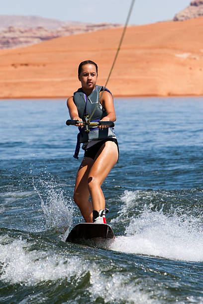 ragazza wakeboarder at lake powell - wakeboarding motorboating extreme sports waterskiing foto e immagini stock