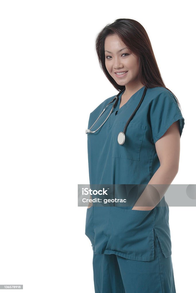 Attraente asiatiche infermiere in scurbs - Foto stock royalty-free di Accessorio personale