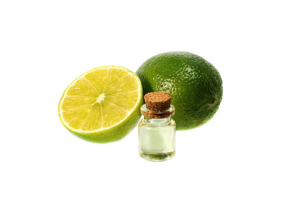 istock Lime essential oil and whole lime. Aromatherapy. Isolated 1365790224