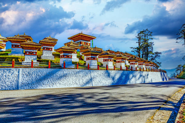Druk Wangyal Khangzang Stupa with 108 chortens, Dochula Pass, Bhutan. Dochula pass is located on the way to Punakha from Thimphu Druk Wangyal Khangzang Stupa with 108 chortens, Dochula Pass, Bhutan. Dochula pass is located on the way to Punakha from Thimphu.Travel and religion concept. bhutanese culture photos stock pictures, royalty-free photos & images
