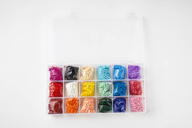 istock colorful beads in the box with cells. set for creativity and needlework. 1365792366