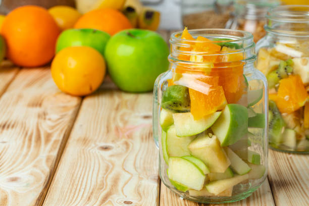 istock Glass bowl with fresh fruit pieces close up 1365807672