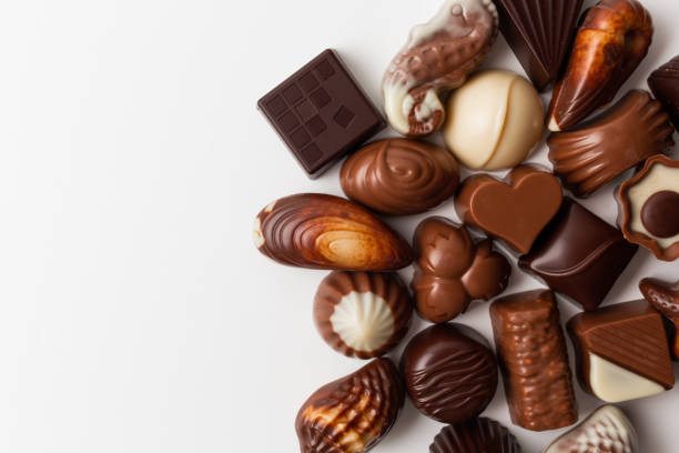 istock Variety of chocolates isolated on white background. 1365809539