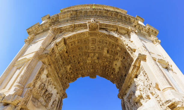 titus arch in the roman forum on a sunny summer day. rome, italy. - arch of titus imagens e fotografias de stock