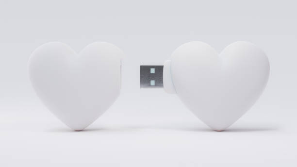 istock Flash drive white heart shape Sending love information. transfer data love and relationship concept. 3D Render. 1365819400