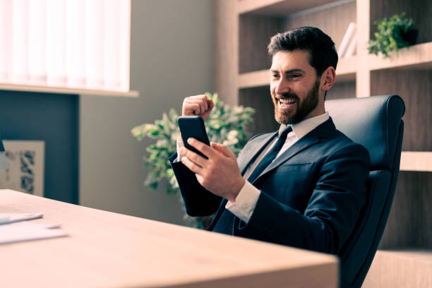 istock Businessman sitting at computer desk in the office 1365823161