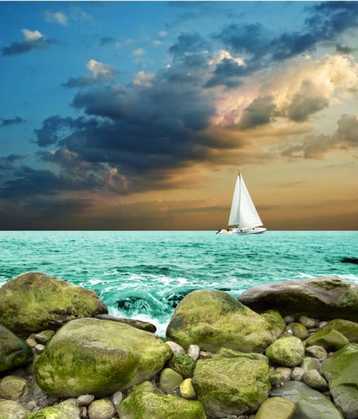 white yacht in a sea at the evening
