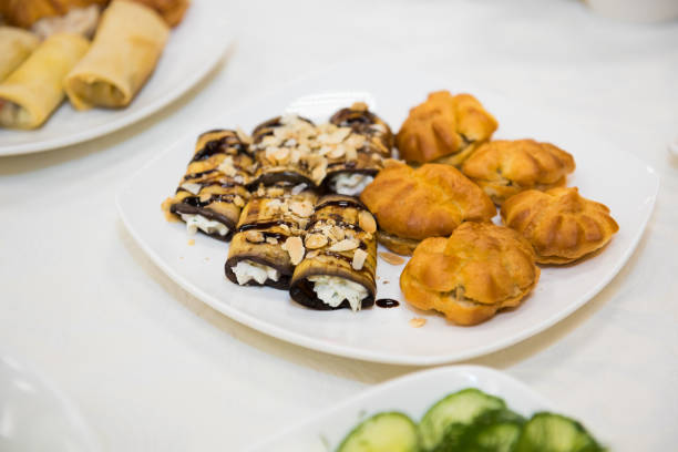 Culinary baked appetizer on dishes.