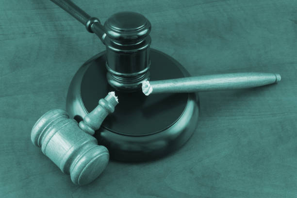 istock Two judge gavels, one gavel broken. 1365840681
