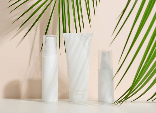 istock bottle, empty white plastic tubes for cosmetics. Packaging for cream, gel, serum, advertising and product promotion, mock up 1365842866