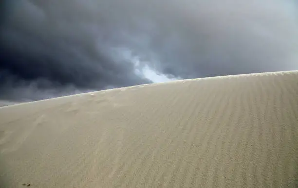 Photo of Climbing white dune