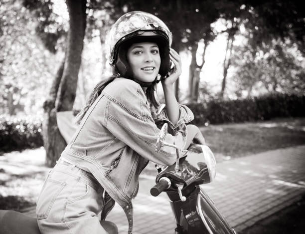 istock Young Girl and Her Motor Scooter 1365845781