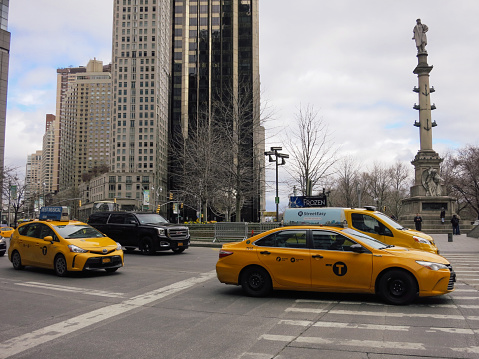 New York, USA - 03 25 2018: Central Manhattan with yellow taxi cabs.
