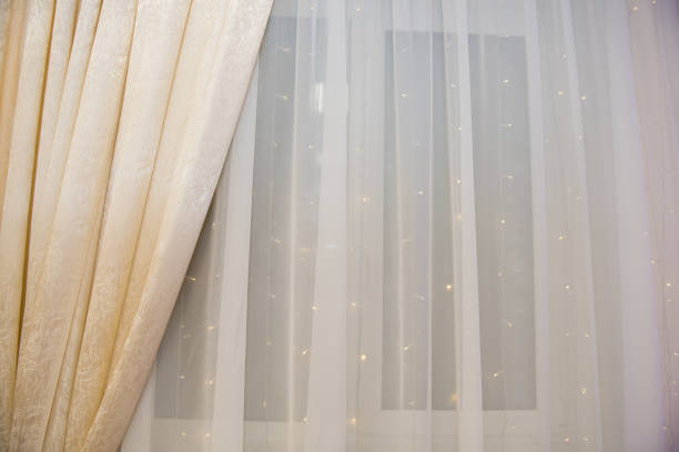 istock Curtain with tulle on the window. 1365846526