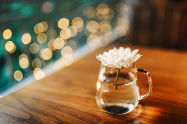 Cafe table with fresh flower decoration