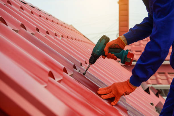 istock Close up hands in protective gloves of young man worker 1365847201