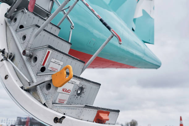 istock Doors is open. Turboprop aircraft parked on the runway at daytime 1365850558