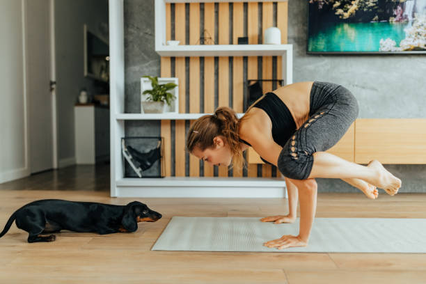 istock Athletic female, doing exercises at home. 1365850621