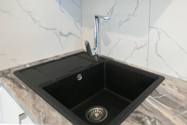 istock Black marble sink and faucet 1365851978