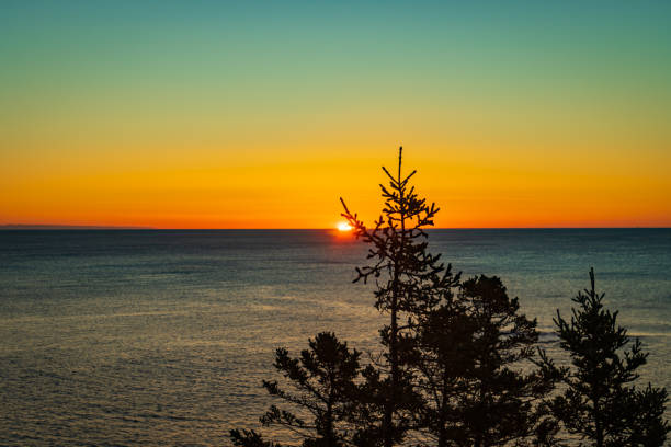 istock sun rising on the Atlantic ocean horizon 1365854958