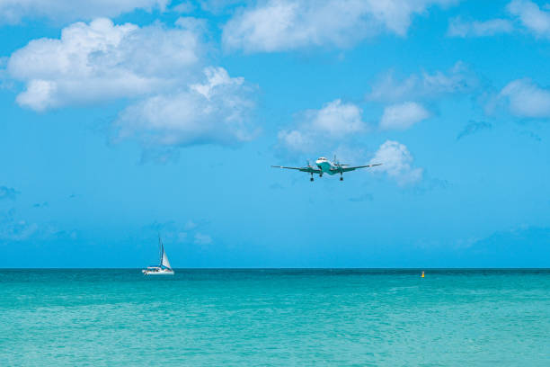 istock Plane that lands on a small island in the Caribbean 1365855323