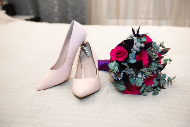 Accessories shoes and bridal bouquet for the wedding.