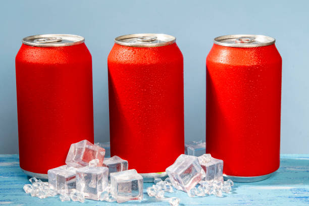 istock red soda can on blue background 1365860361