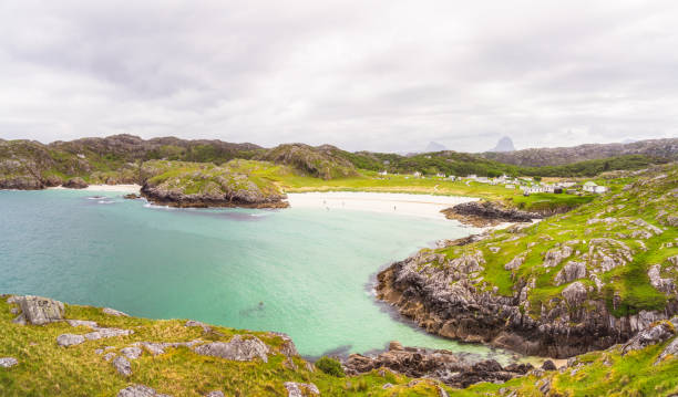 A view from the strait of the Abbey of Iona and Bishops House, Isle of Iona, Inner Hebrides, Scotland