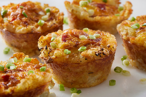 Crispy Tatar Tot Breakfast Egg Cups with Bacon, Red Peppers and Cheddar Cheese