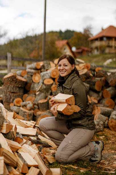 Brunette woman doing hard work outside.