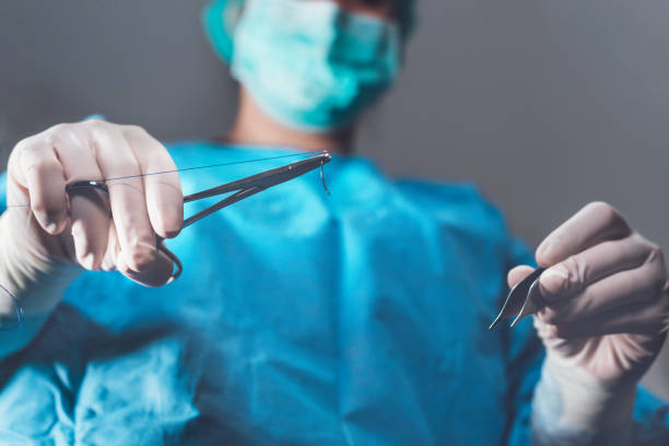 Female surgeon in operating theater. High quality photo stock photo