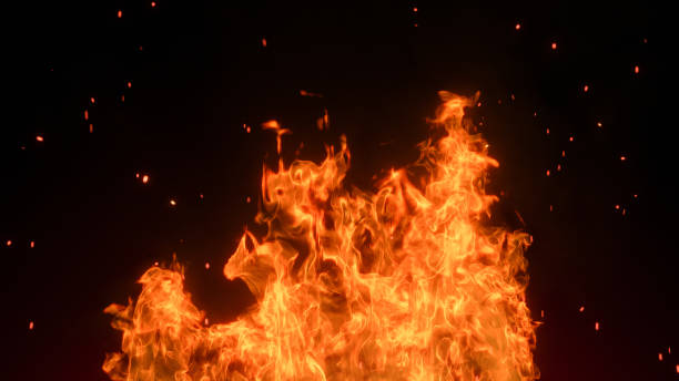 fuego 3d y brasas ardientes brillando. partículas brillantes de fuego sobre fondo negro - fire fotografías e imágenes de stock