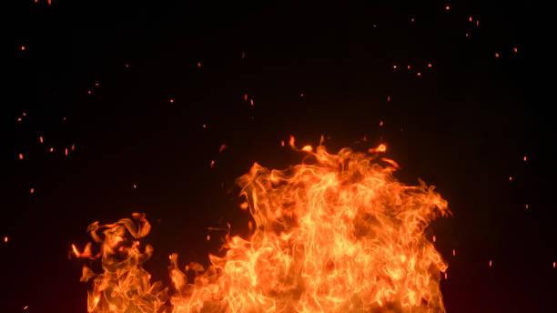 istock 3D fire and Burning embers glowing. Fire Glowing Particles on Black Background 1365868261